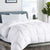 A Dreamy Nights Dream Foam Gel Synthetic Comforter with all-season warmth on a bed in a bedroom.