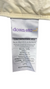 A white product label stitched onto fabric, featuring "down etc" in gray and purple with three yellow stars. Below, details state the item was manufactured by Down Etc. The label provides care instructions and states the filling is hypo-allergenic and of an all-new nature. UPC: 822779205352.